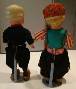 Offered is a pair of celluloid & wood Dutch boy and girl dolls in 