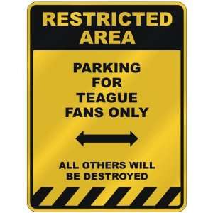  RESTRICTED AREA  PARKING FOR TEAGUE FANS ONLY  PARKING 