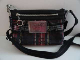Available to you is a Coach Poppy Tartan Glam Swingpack Crossbody bag 