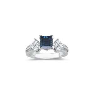  0.80 Cts Diamond & 1.89 Cts London Blue Topaz Ring in 18K 