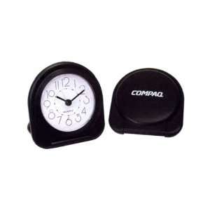  Folding travel alarm clock with an easy to read dial and 