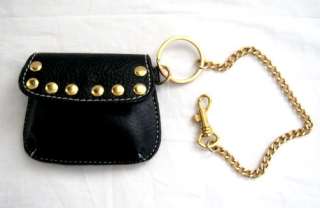 Black leatherette coin purse / keyring by Kathy Van Zeeland. It 