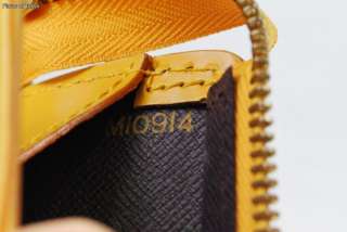 Authentic Louis Vuitton Yellow Epi SAC TRIANGLE Handbag  