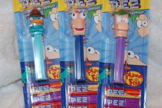 Phineas and Ferb plus Perry Pez dispensers plus candy  