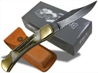   slightly with each knife. Gift box and leather belt sheath included