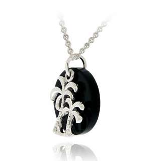  necklace showcases an onyx disc and polished palm tree charms 