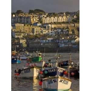 Stormy Sky at Sunset with Small Fishing Boats in the Harbour at St 